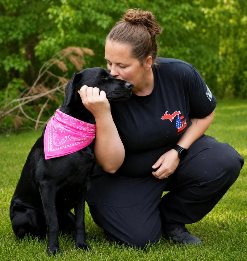 An adult medium-sized female Black Labradoodle dog named Nova for adoption in Cheboygan, MI