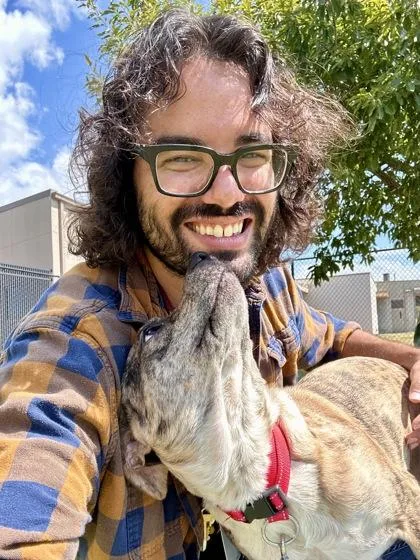 A young medium-sized male Mixed Breed dog named Wacky Inflatable Tube Man for adoption in Wichita, KS
